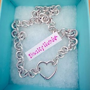 Tiffany & Co Clasping Heart Necklace